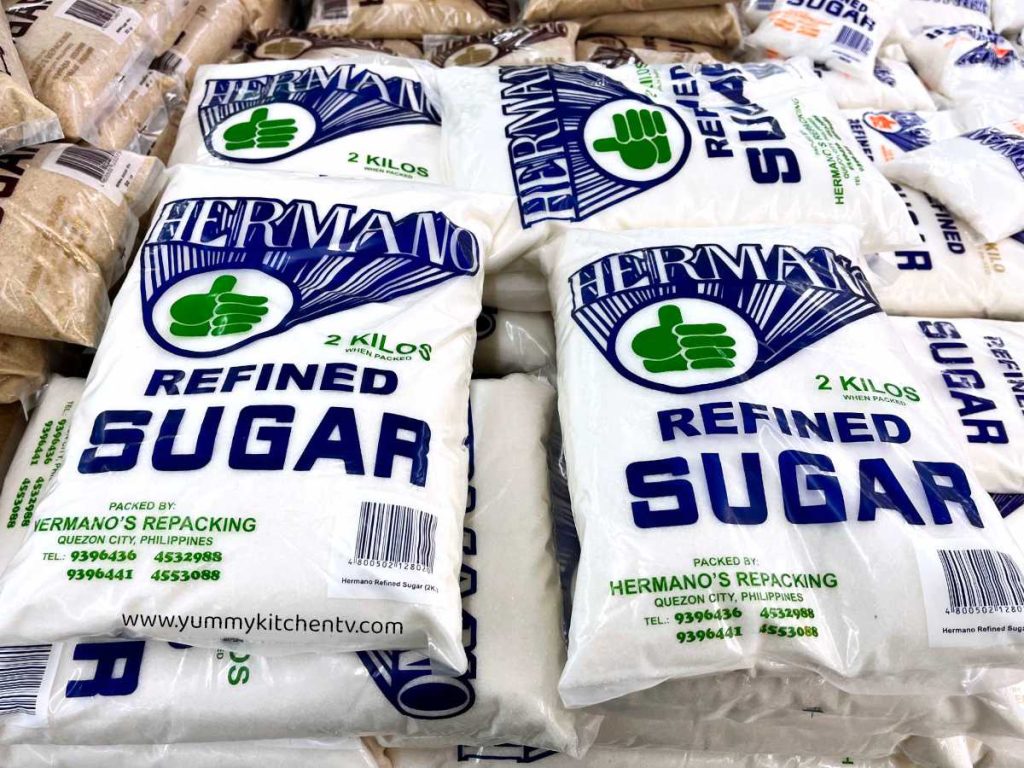 Refined White Sugar in packs at the store