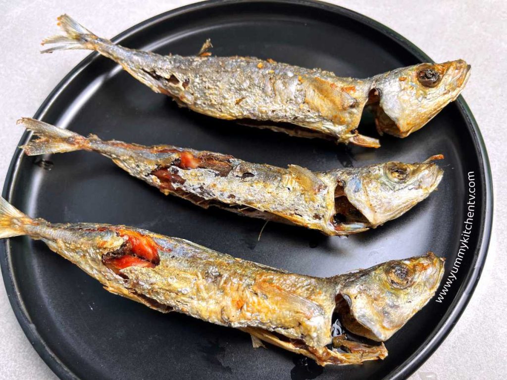 fried galunggong fish blue mackerel scad, round scad, maachili or shortfin scad