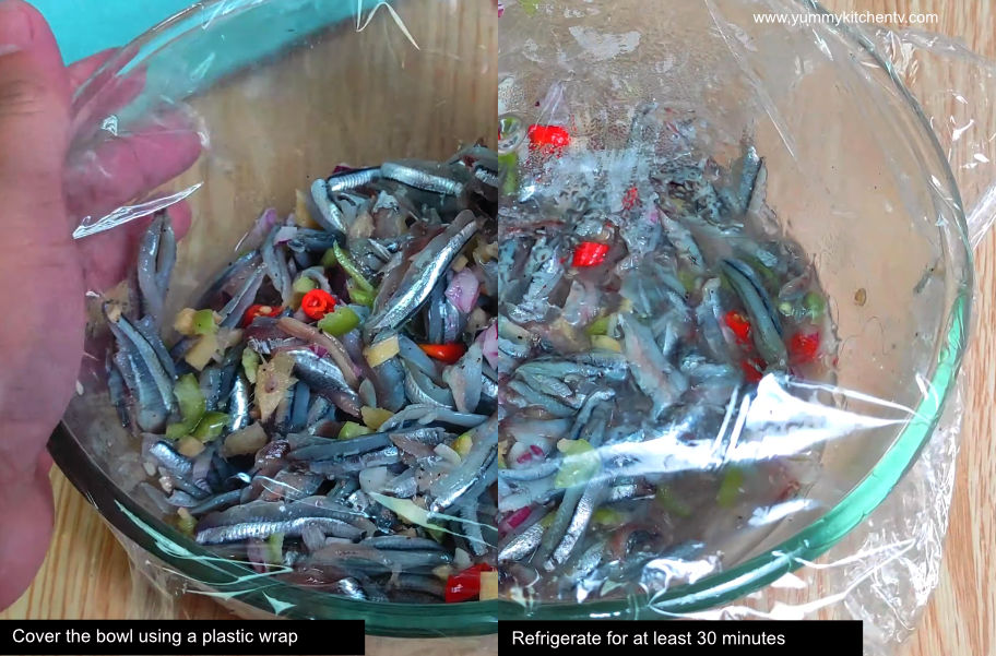 Close-up of kinilaw na dilis with ginger, red chilies, and onions